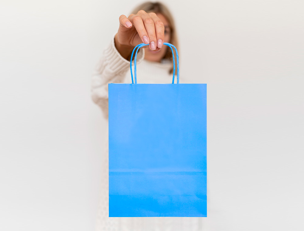 BOLSA PAPEL Q-CONNECT CELULOSA CELESTE M CON ASA RETORCIDA 270X370X120 MM