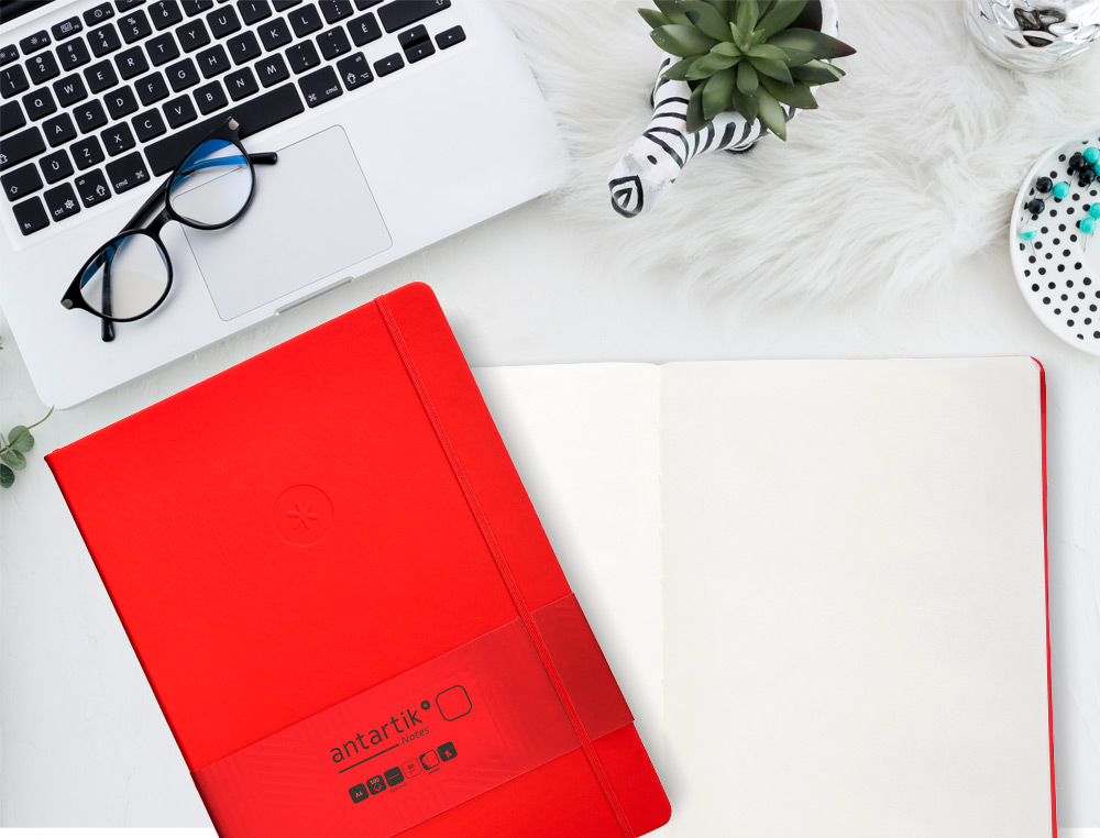CUADERNO CON GOMILLA ANTARTIK NOTES TAPA DURA A4 HOJAS LISAS ROJO 100 HOJAS 80 GR FSC